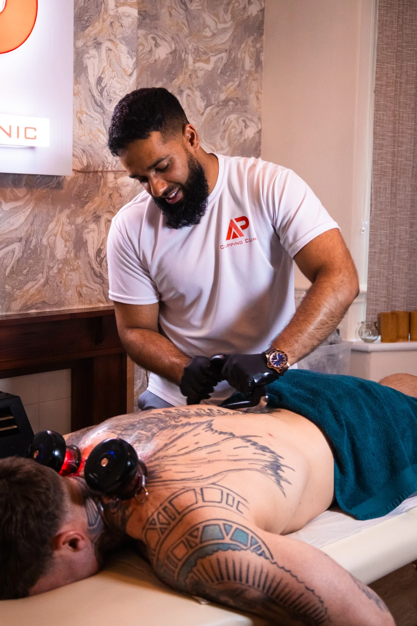 AP Cupping Clinic signature recovery treatment